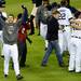 Detroit Tigers' pitcher Justin Verlander raises his arms after the Tigers beat the Yankees 8-1 during Game 4 of the ALCS and clinching a spot in the World Series at Comerica Park in Detroit on Thursday night.